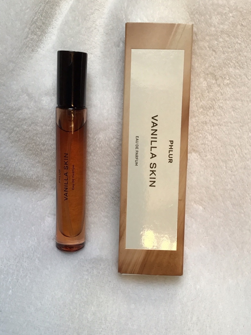PHLUR Vanilla Skin travel spray, spritzed twice. In original box.